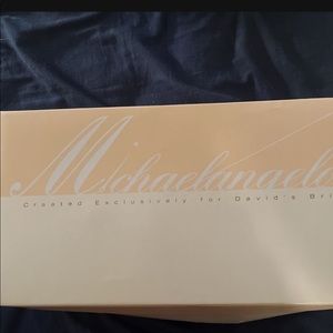 Wedding shoes size 5 light pink. Never worn but to try on.